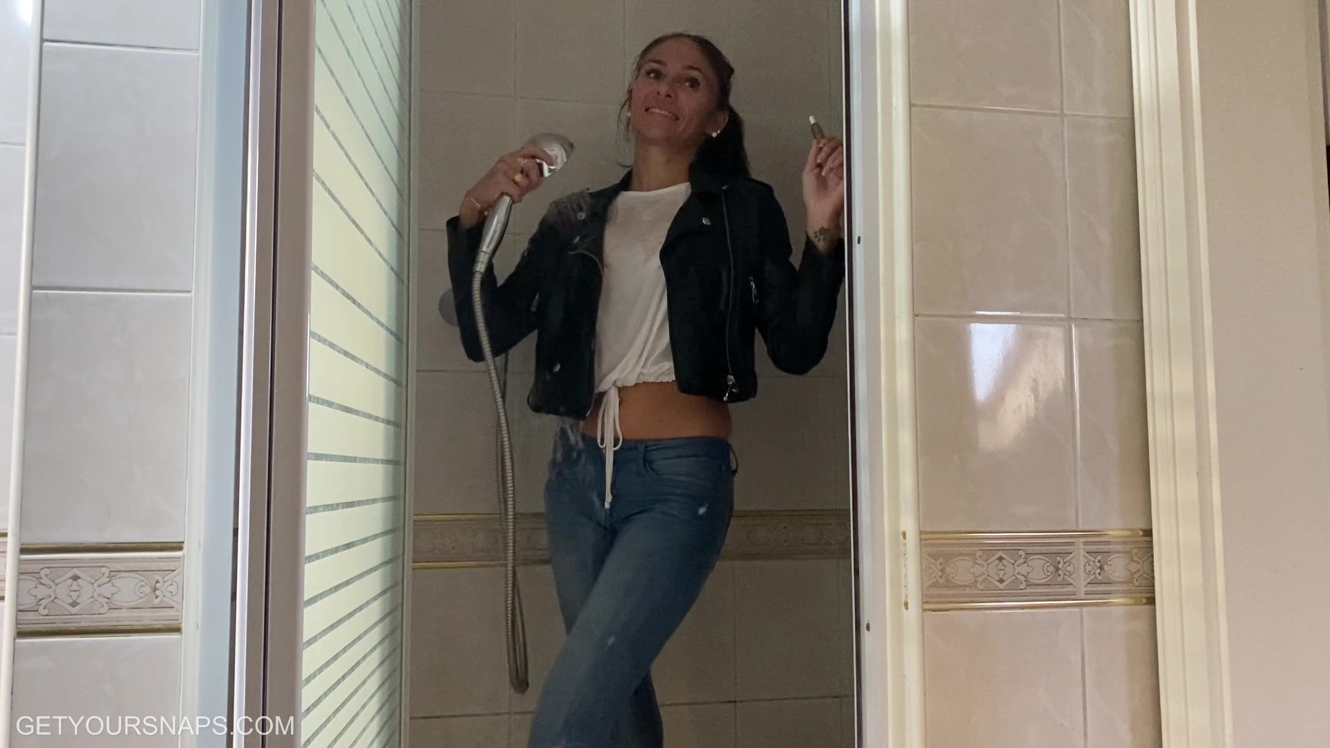Olga gets wet in jeans and leather jacket – Get Your Snaps
