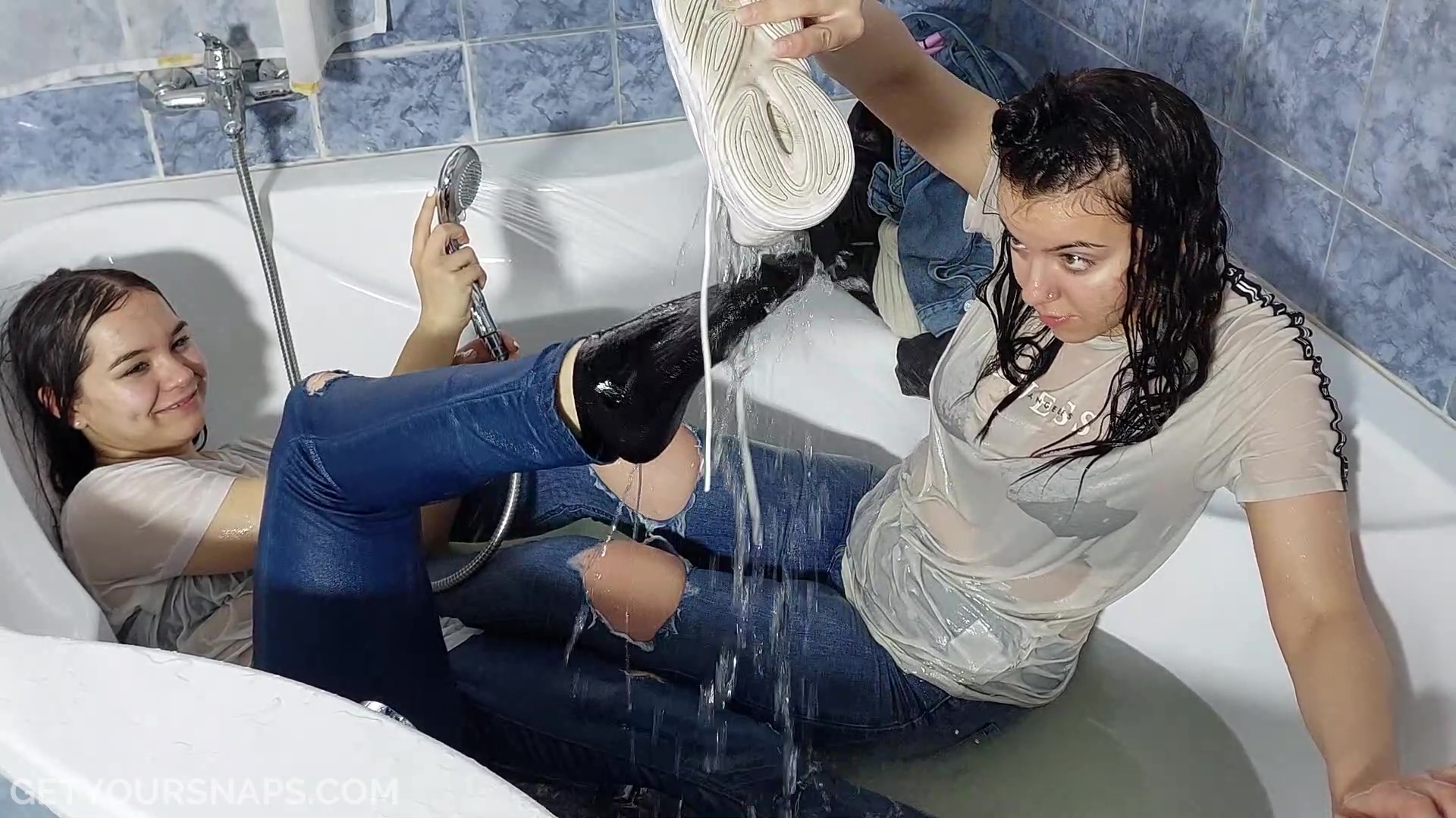 Kyra and Lara gets wet in jeans - frame at 7m59s