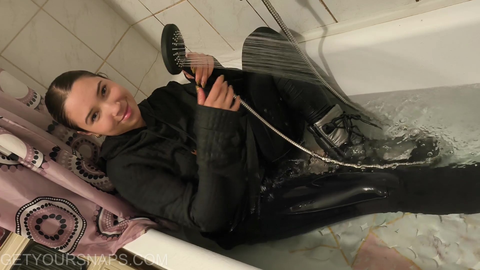 Ellie gets wet in black - Image 4