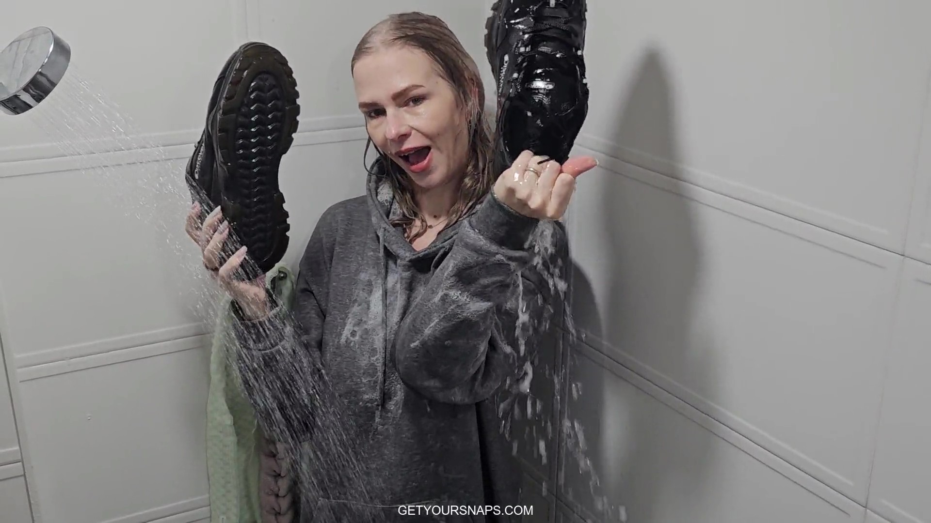 Rain takes a shower in clothes