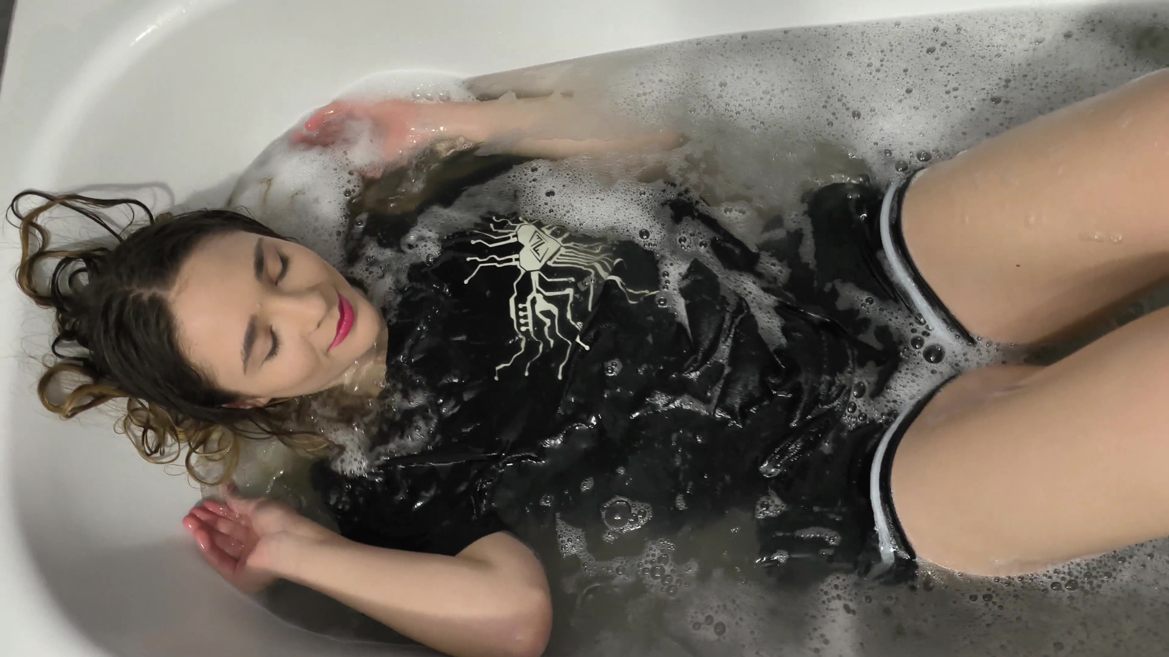 Violet gets wet in black shorts and a black T-shirt - Image 5