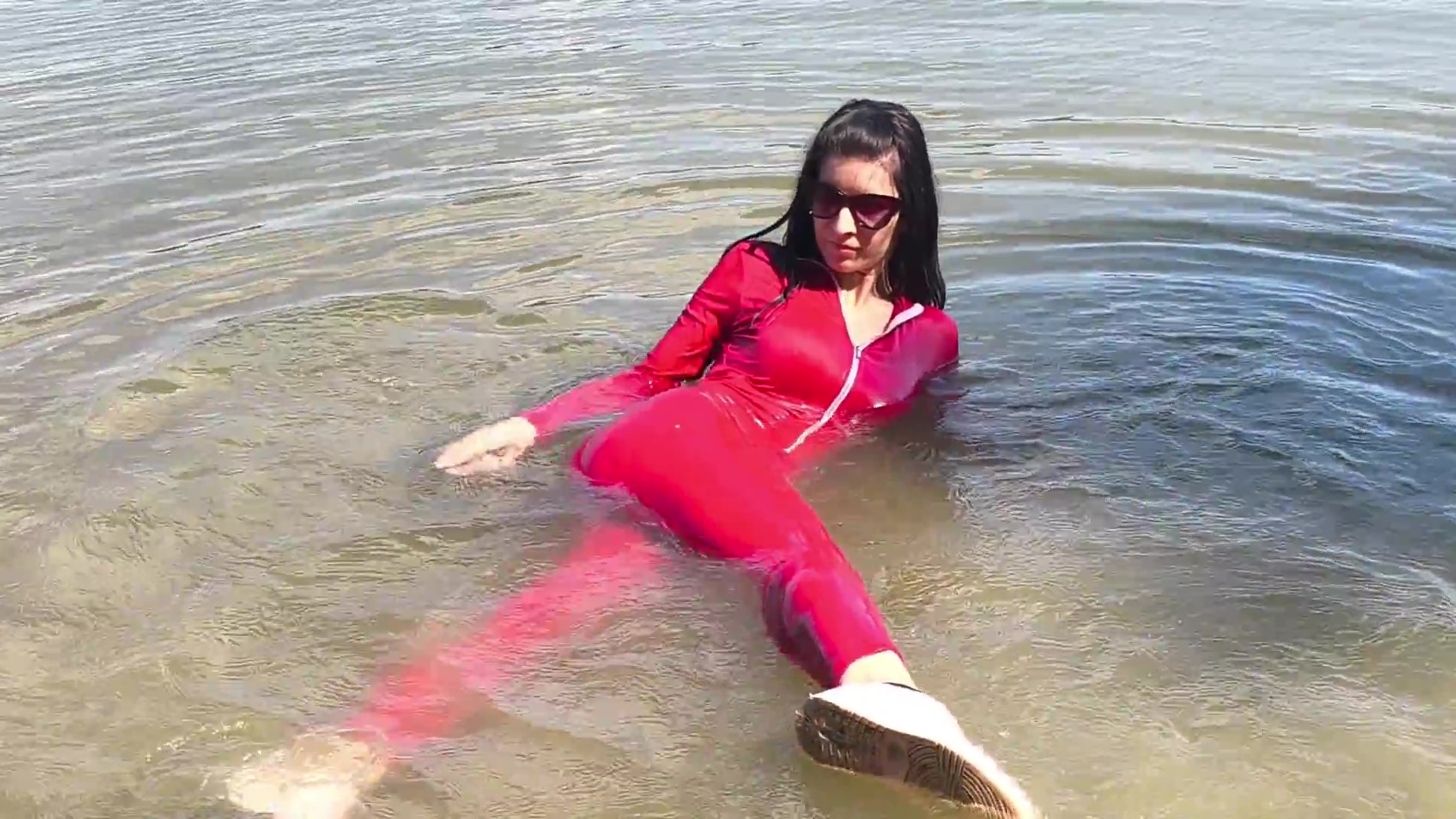 Alessia gets wet in hot red overall - frame at 4m8s