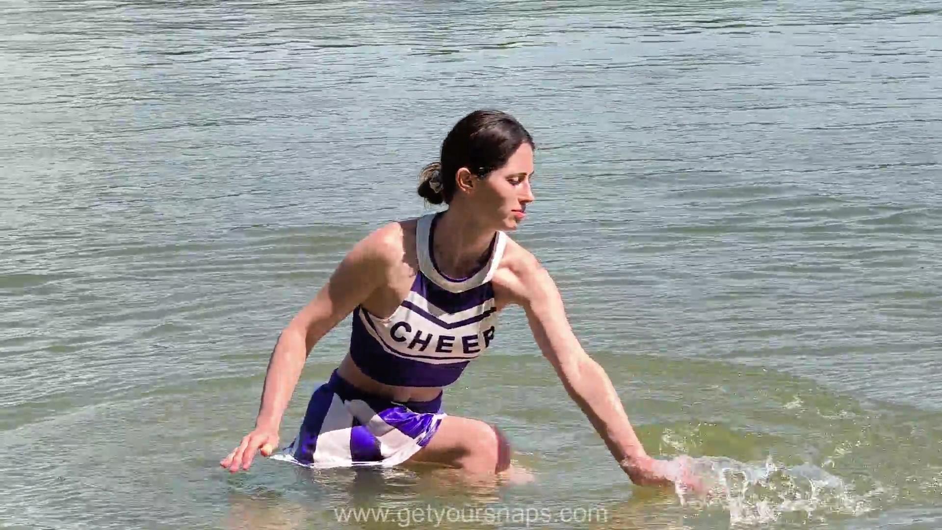 Nina Cools Down in Cheerleader Clothes